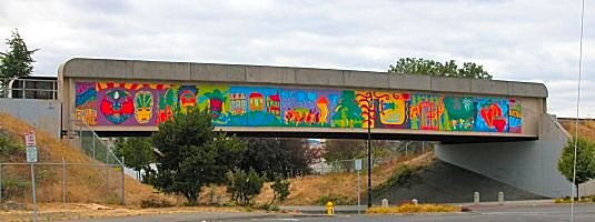 Overpass mural painted by high school art project